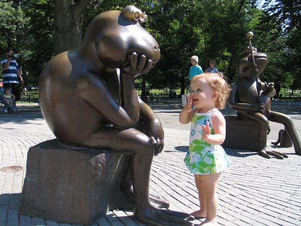 Adorable Girl Mimics Statue