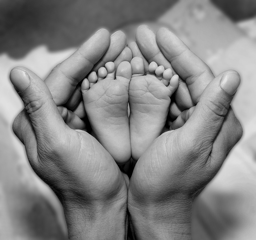 Motherâ€™s Hands and Babyâ€™s Feet